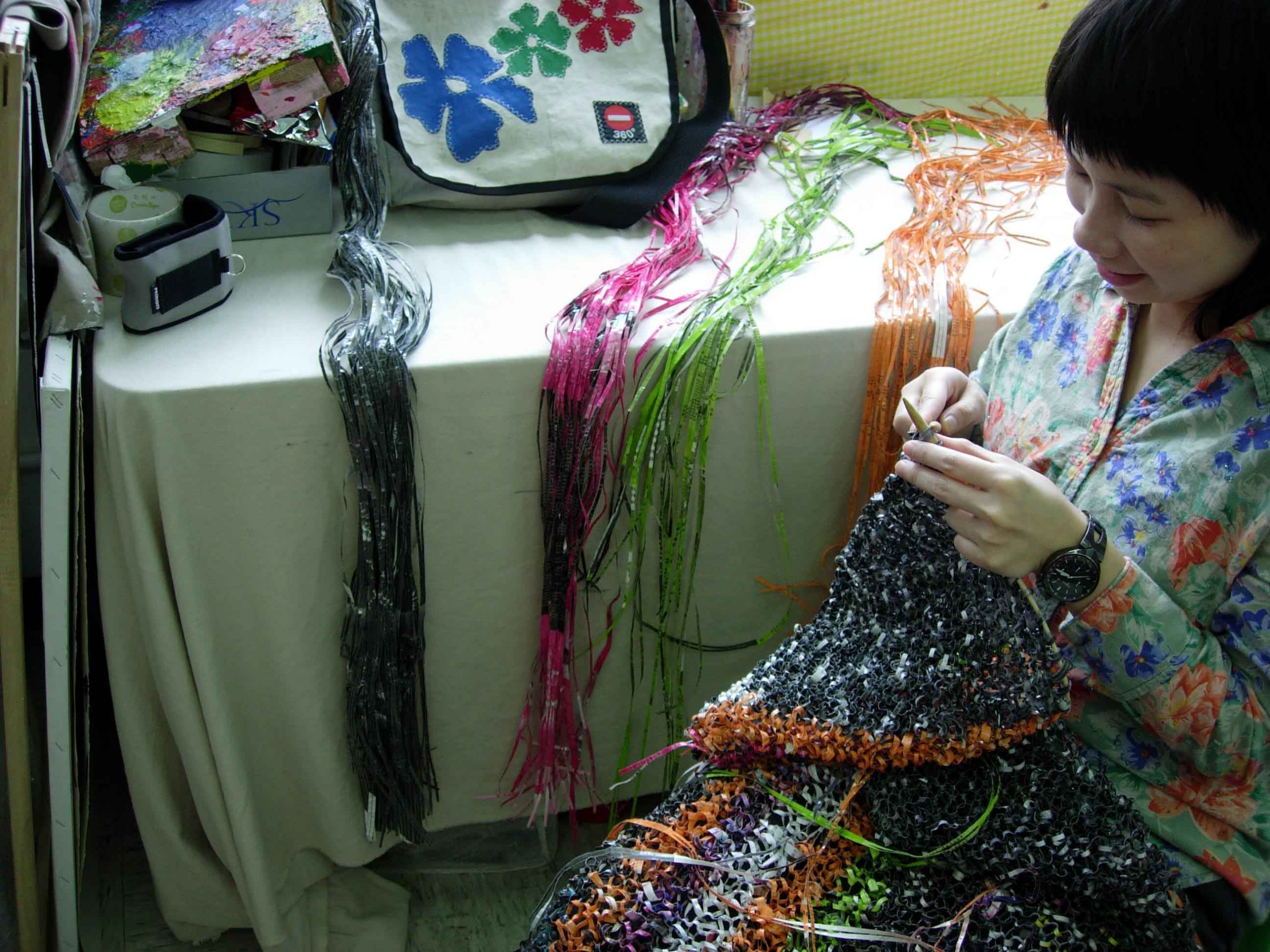 Movana Chen in the process of making her artwork.